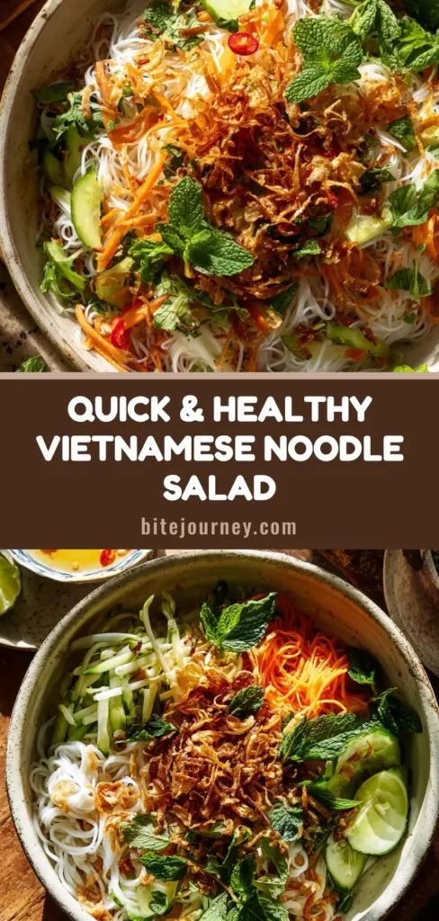 Top-down view of a vibrant Vietnamese noodle salad in a rustic off-white ceramic bowl with fresh vegetables and crispy shallots.