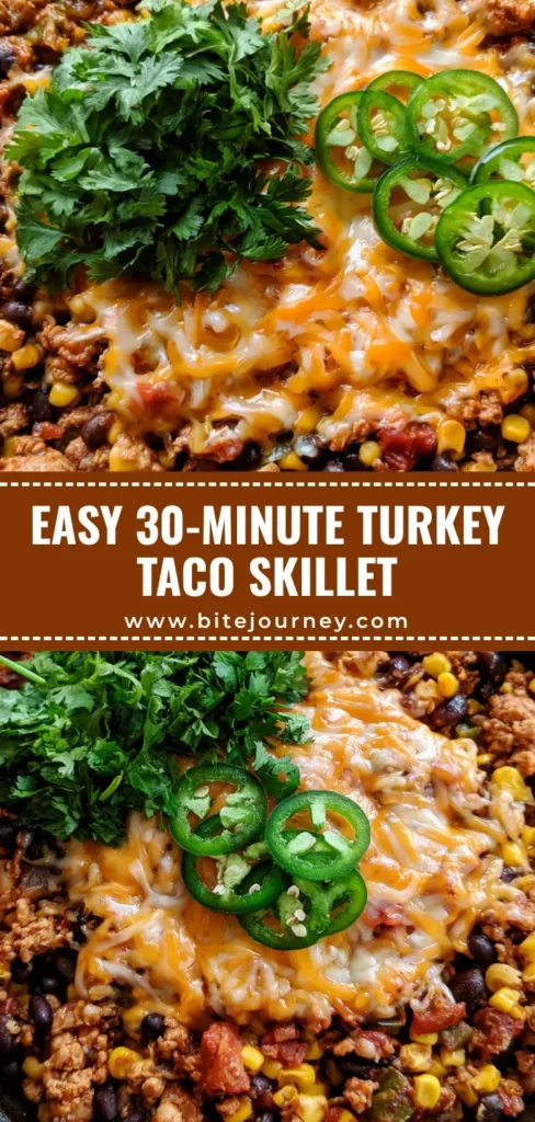 A top-down view of a Ground Turkey Taco Skillet in a cast iron pan featuring melted cheese, black beans, corn, and fresh cilantro on a dark wood background.