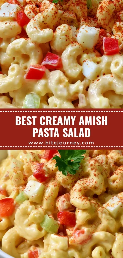 A close-up shot of a white ceramic bowl filled with Amish pasta salad featuring creamy dressing, red peppers, and a parsley garnish.