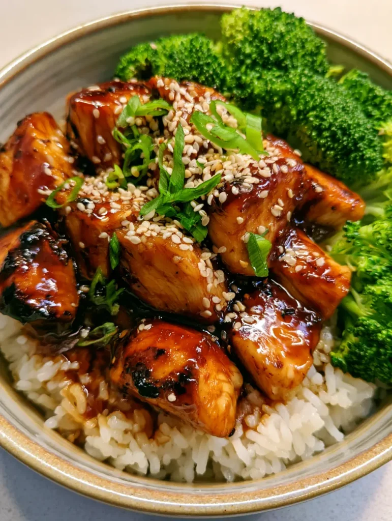 Teriyaki Chicken Bowl from a high angle on a neutral kitchen counter with natural lighting.